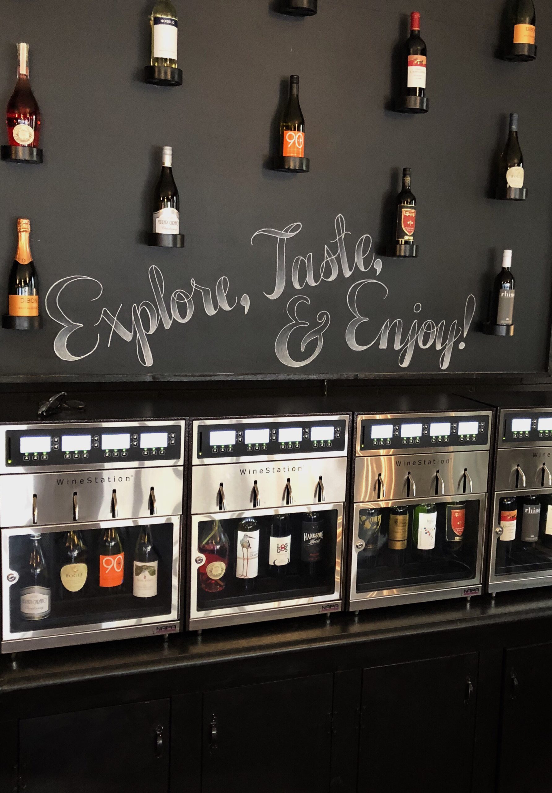 Image A wine station at Crema & vine, a self serve wine bar.